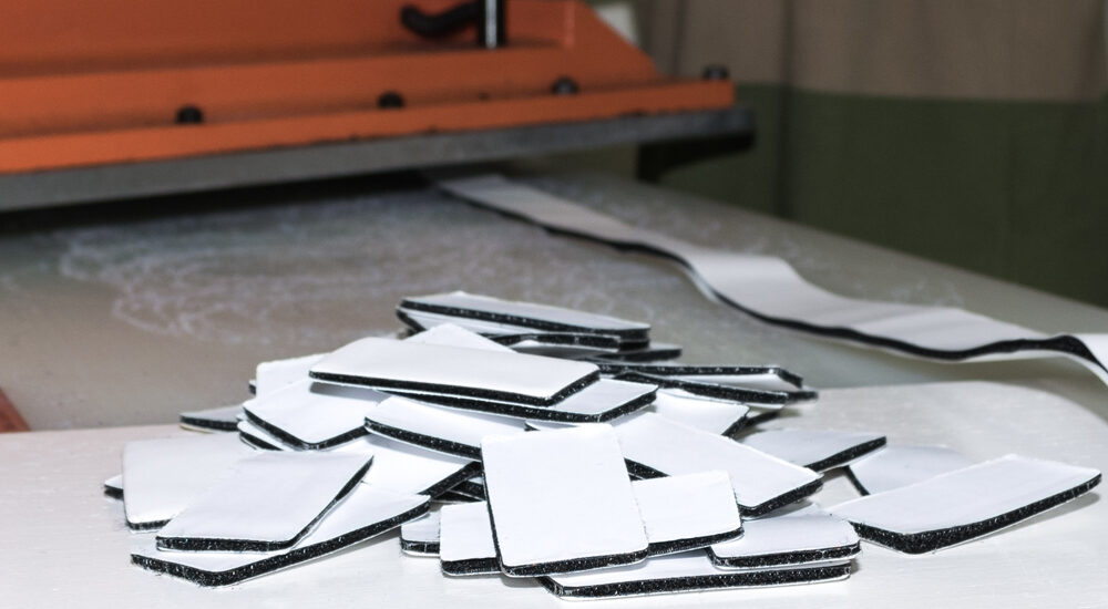 industrial-die-cutting-with-hands-6-e1570550853115.jpg
