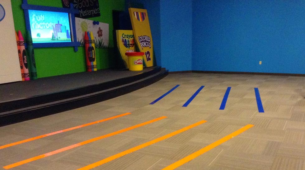 Hook and loop being used in a church to mark off seating for children