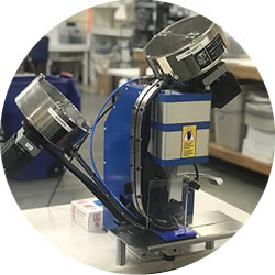 Industrial grommet machine with self-feeding grommets
