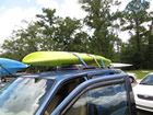 Kayak strapped to pickup truck
